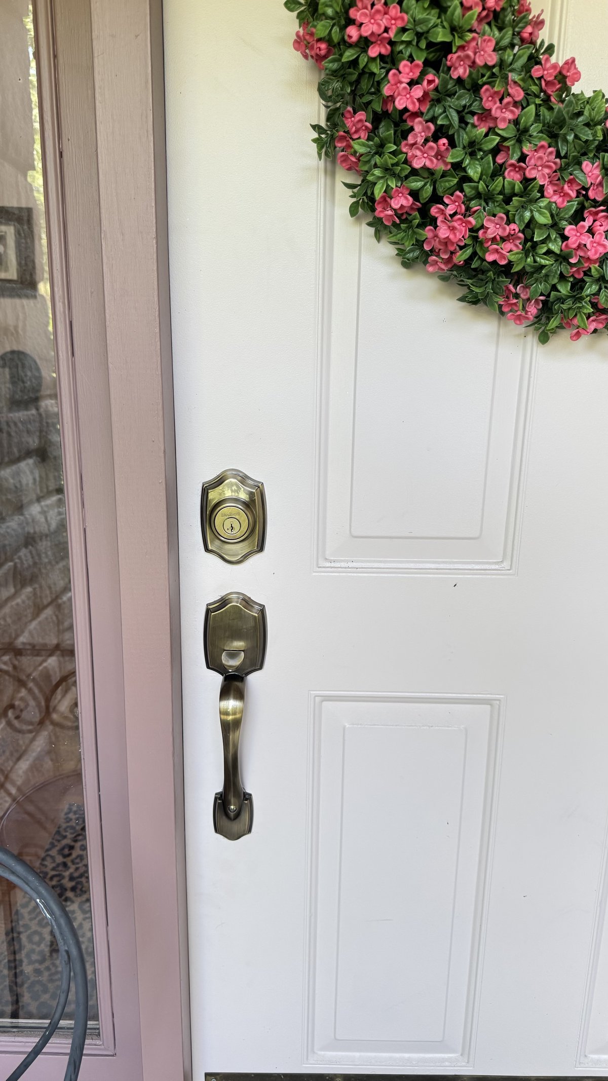 Residential door lock installation by Locksmith Powell Ohio — deadbolt and handleset on white front door in Powell Ohio